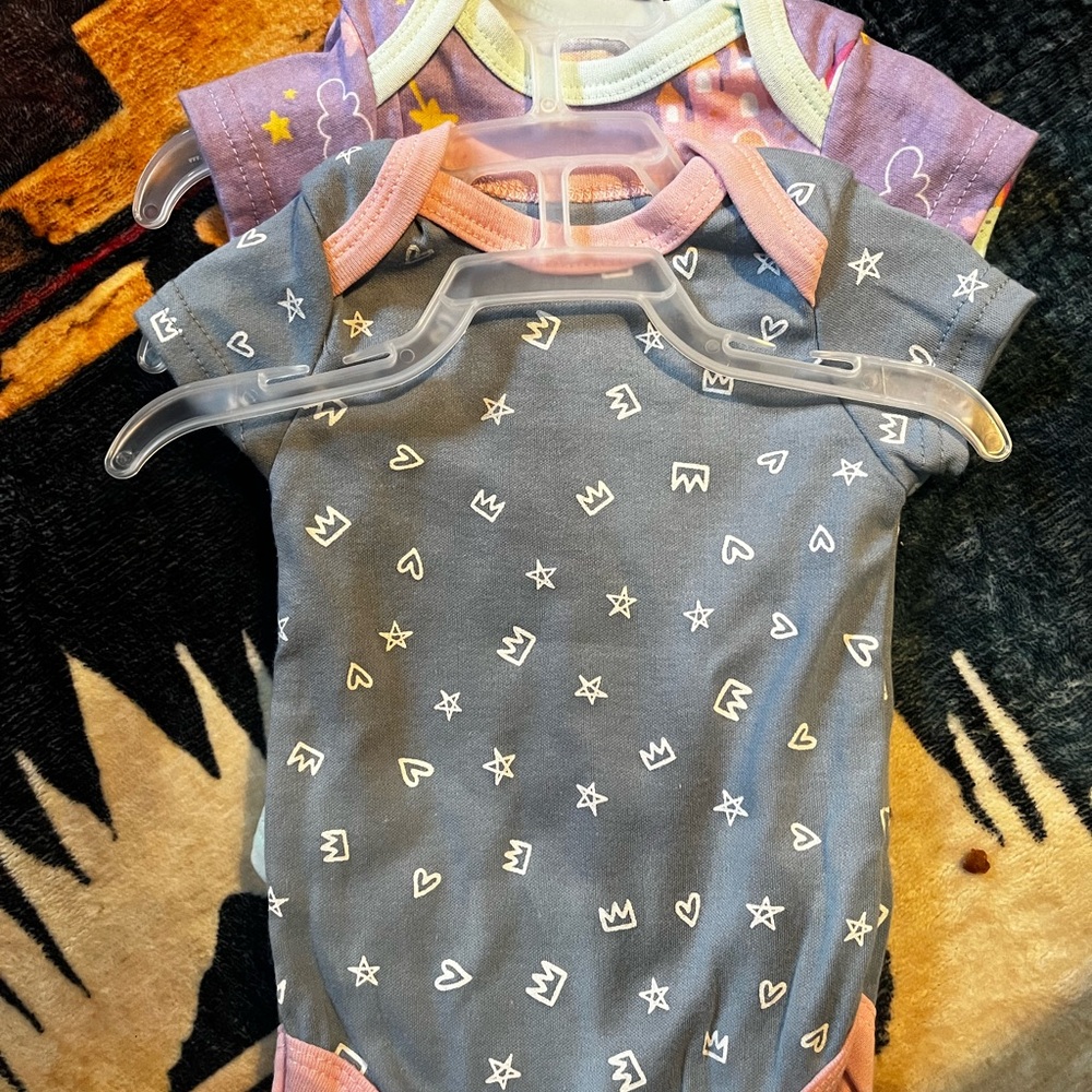Gray and Pink Baby Onesies with Crown and Star Patterns